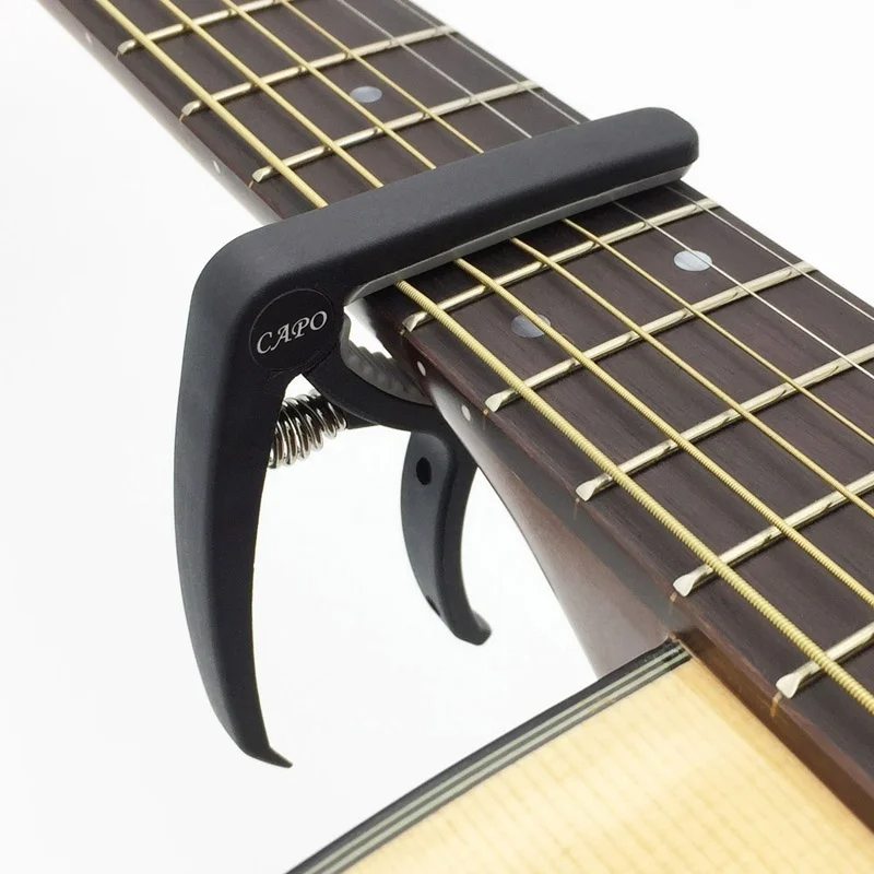 Capo gitar plastik 6 dawai ele - Musical Instrument Names ulasan dan harga