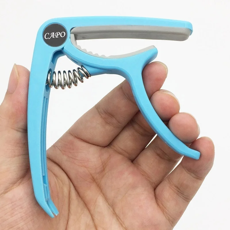 Capo gitar plastik 6 dawai ele - Musical Instrument Names ulasan dan harga